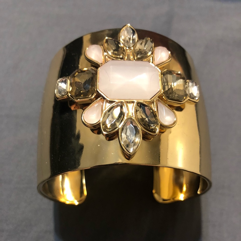 Gold bracelet with stones